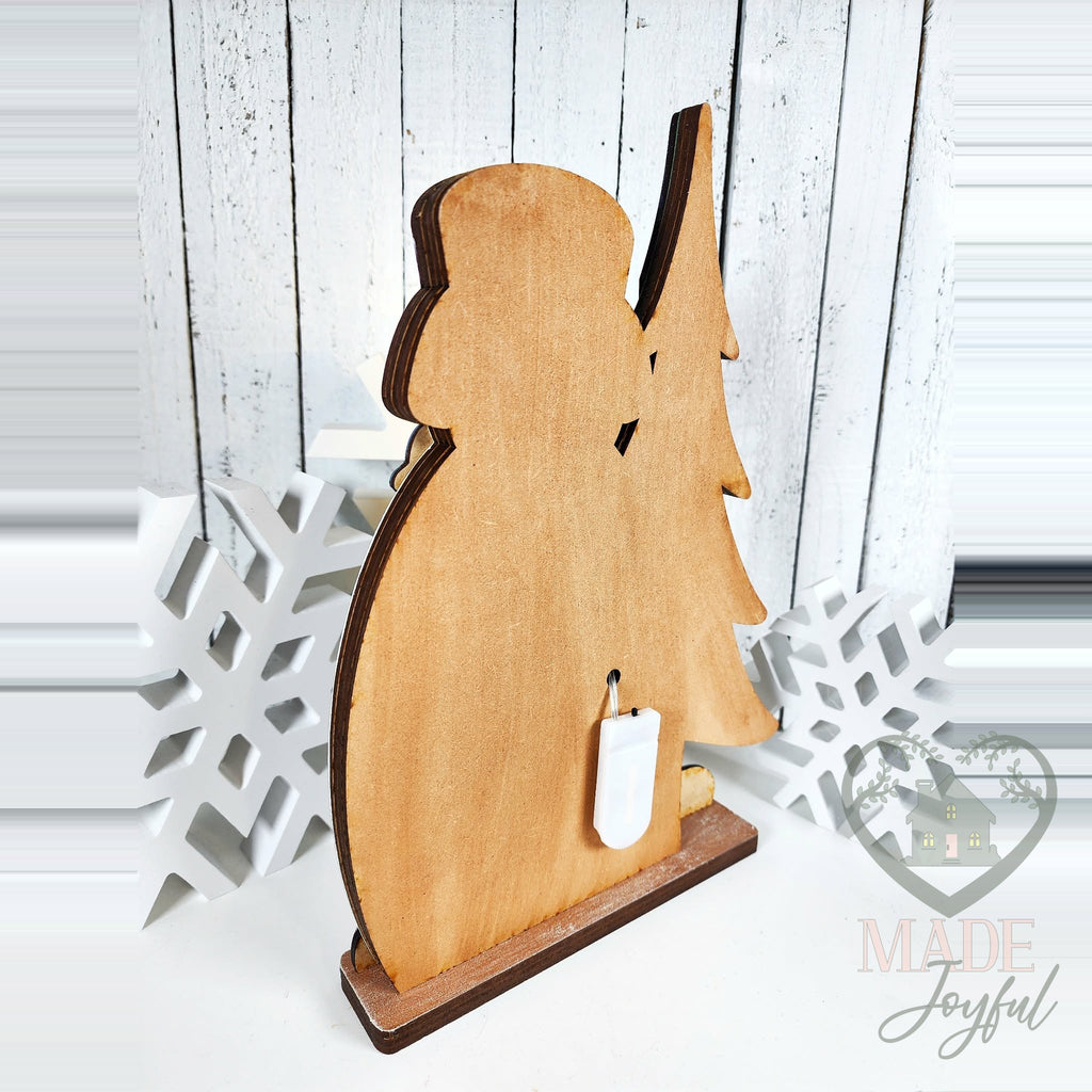 Back of the snowman shelf sitter with battery light pack, hand-painted in Brentwood, TN.