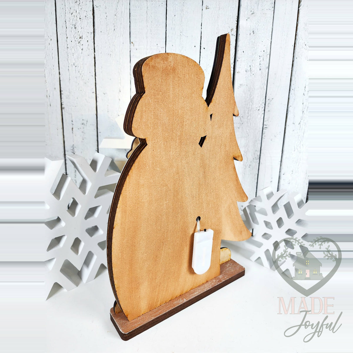 Back of the snowman shelf sitter with battery light pack, hand-painted in Brentwood, TN.