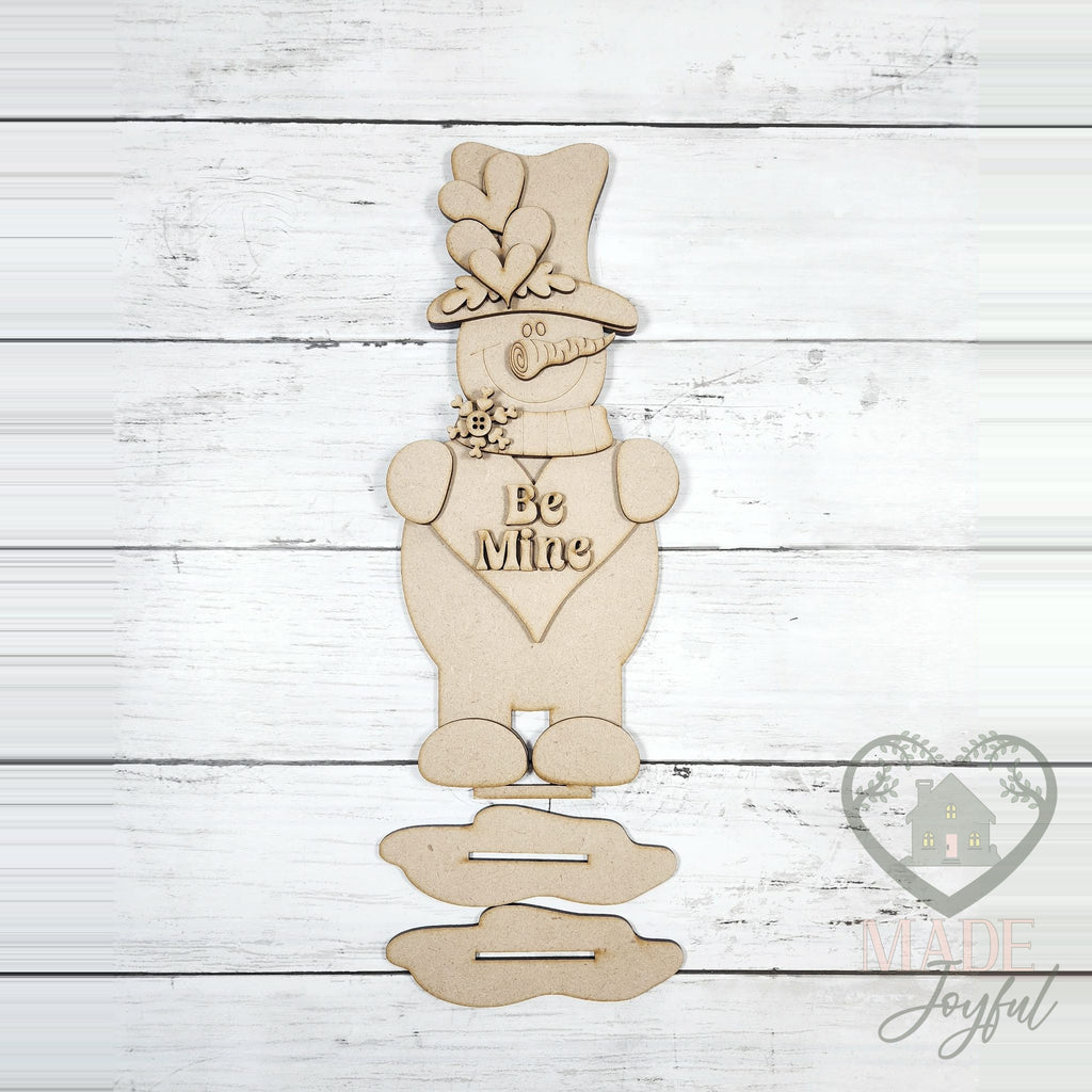 Unfinished laser-cut wood Be Mine Snowman Shelf Sitter DIY kit, ready to paint at a DIY party in Williamson County, TN.