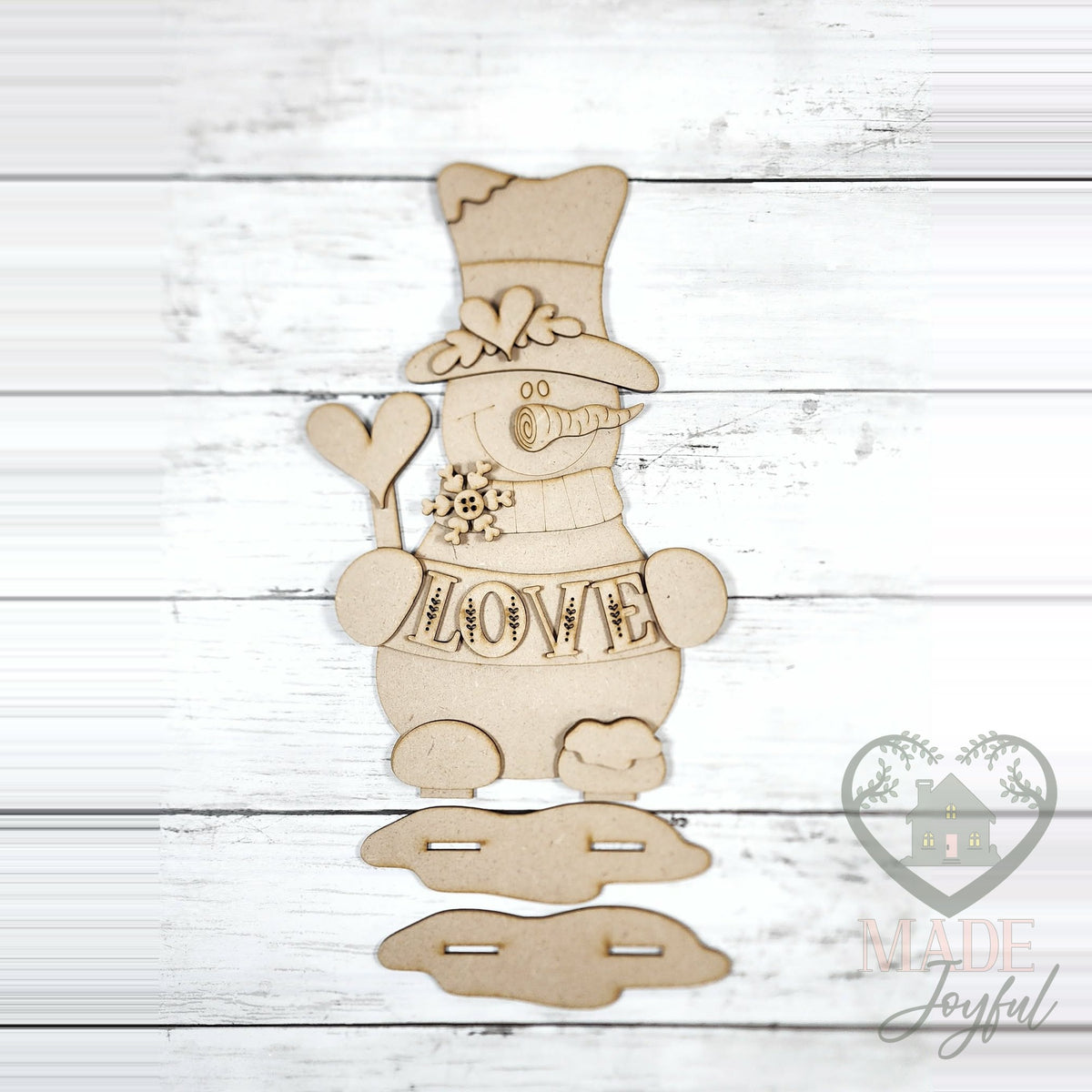 Unfinished laser-cut wood Love Snowman Shelf Sitter DIY kit, ready to paint at a DIY party in Williamson County, TN.