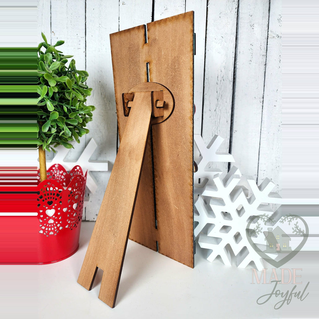 Back of the table top pallet showing the kickstand, hand-painted in Brentwood, TN.