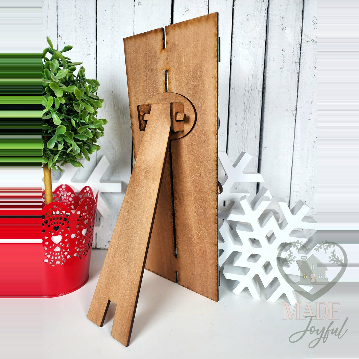 Back of the table top pallet showing the kickstand, hand-painted in Brentwood, TN.