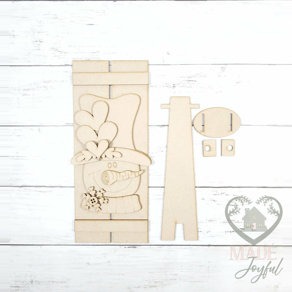 Unfinished laser-cut wood Valentine Snowman Table Top Pallet DIY kit, ready to paint at a DIY party in Williamson County, TN.