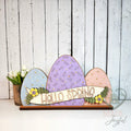 Hello Spring light up egg shelf sitter in blue, purple, and pink, hand-painted in Brentwood, TN.