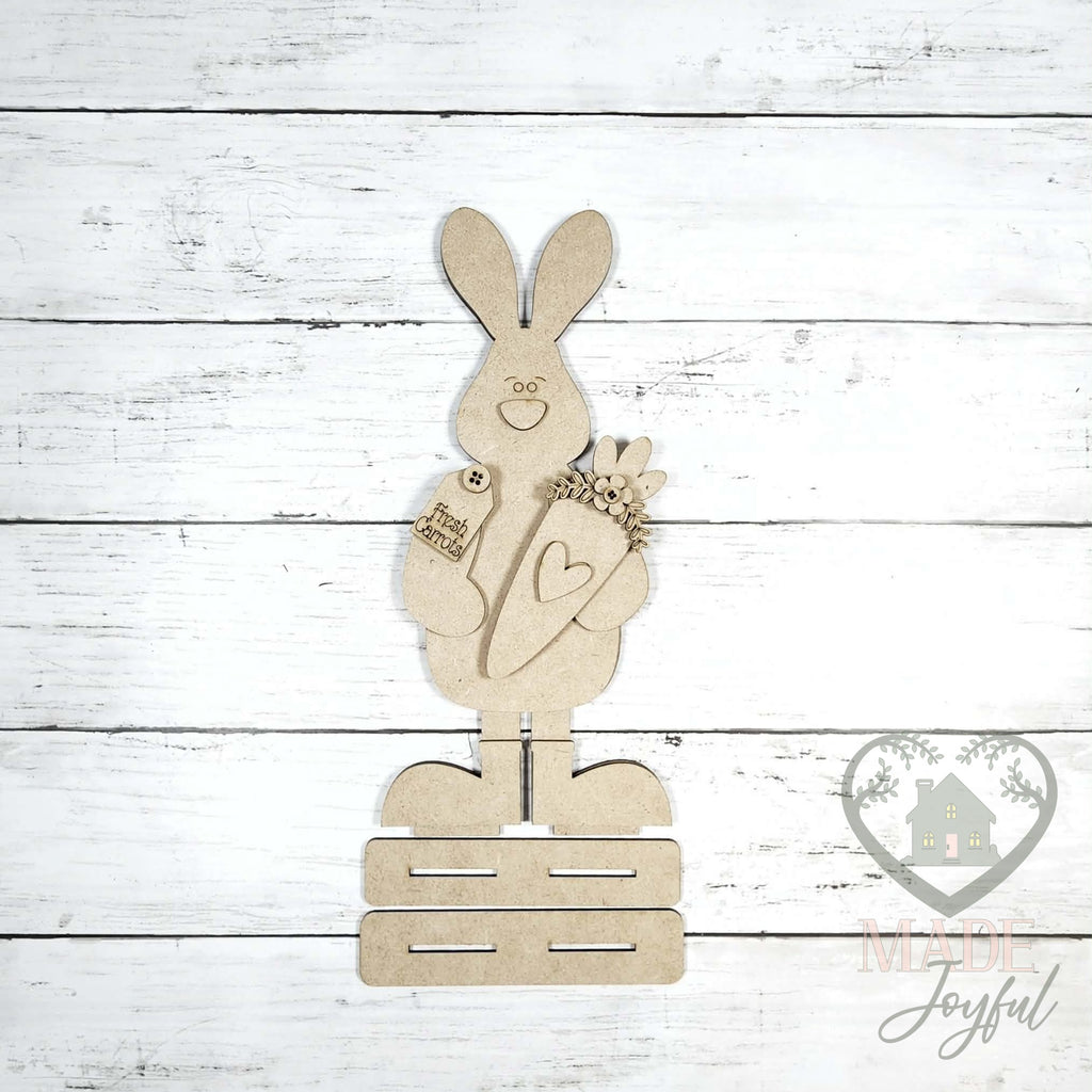 Unfinished laser-cut wood Standing Carrot Bunny Shelf Sitter DIY kit, ready to paint at a DIY party in Williamson County, TN.