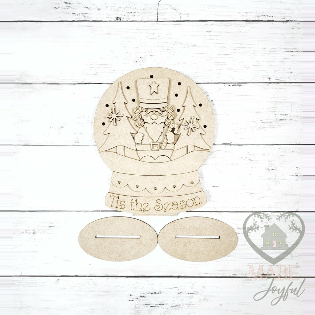 Unfinished laser-cut wood Nutcracker Light Up Snow Globe DIY kit, ready to paint at a DIY party in Williamson County, TN.