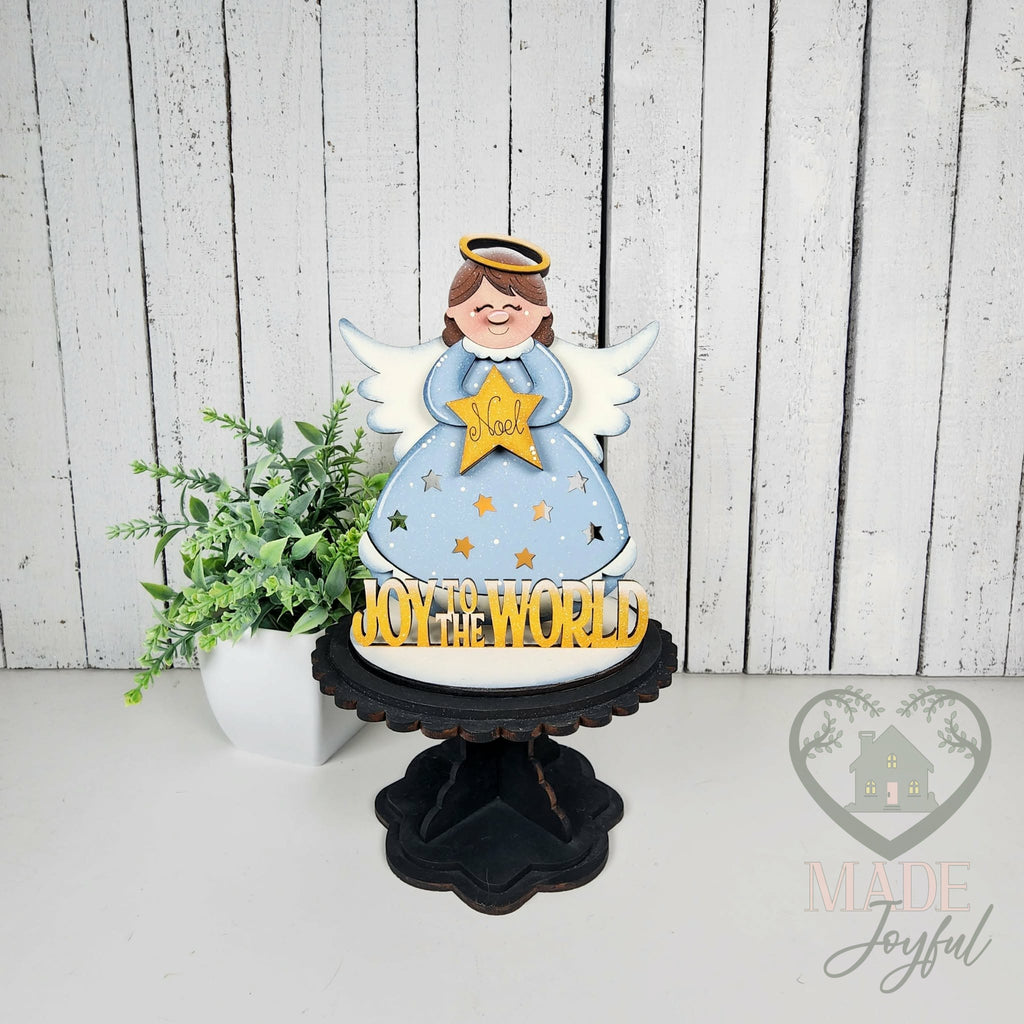 Joy to the World angel votive on a black pedestal, hand-painted in Brentwood, TN.
