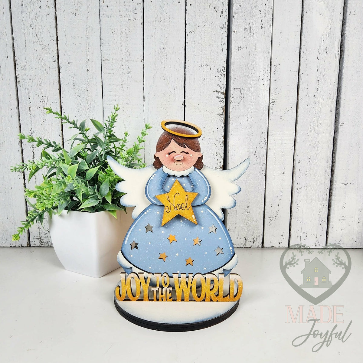 Angel votive on a round base, hand-painted in Brentwood, TN.