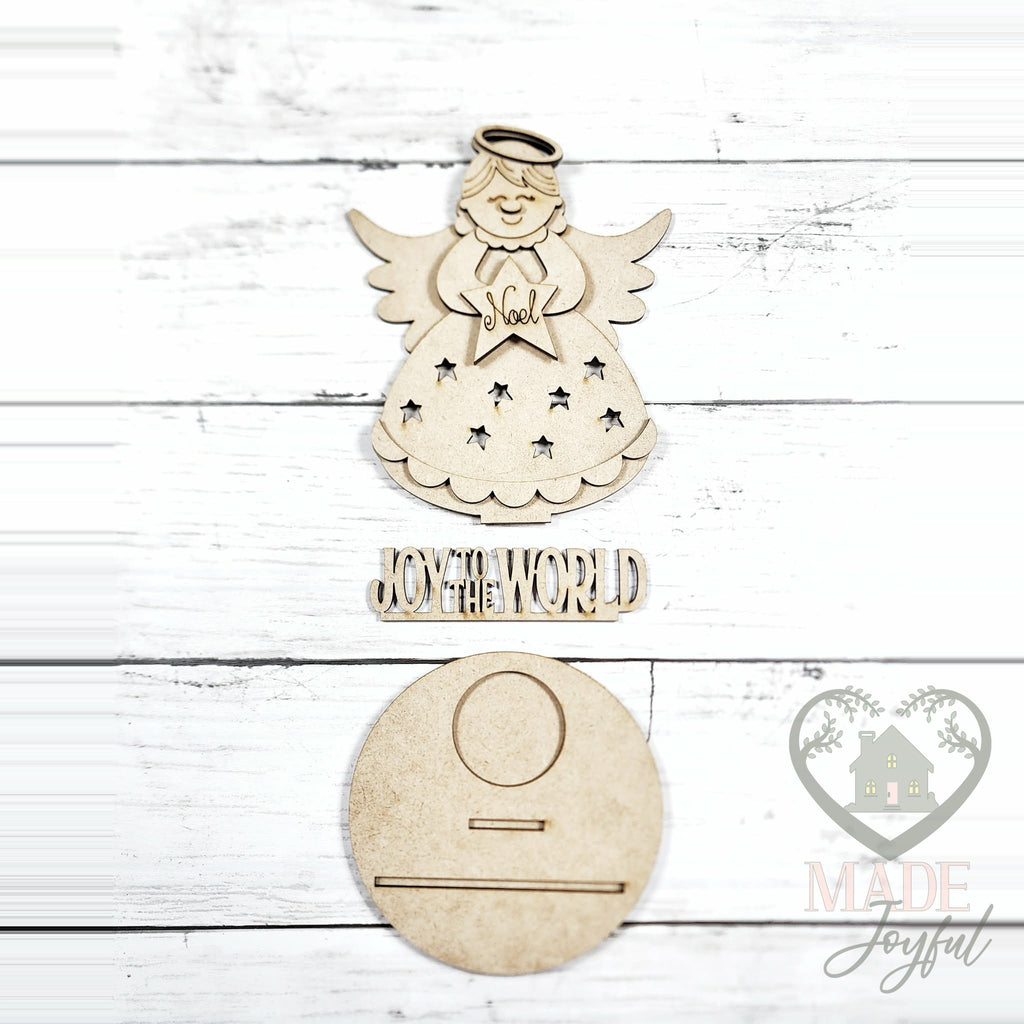 Unfinished laser-cut wood Joy to the World Angel Votive DIY kit, ready to paint at a DIY party in Williamson County, TN.
