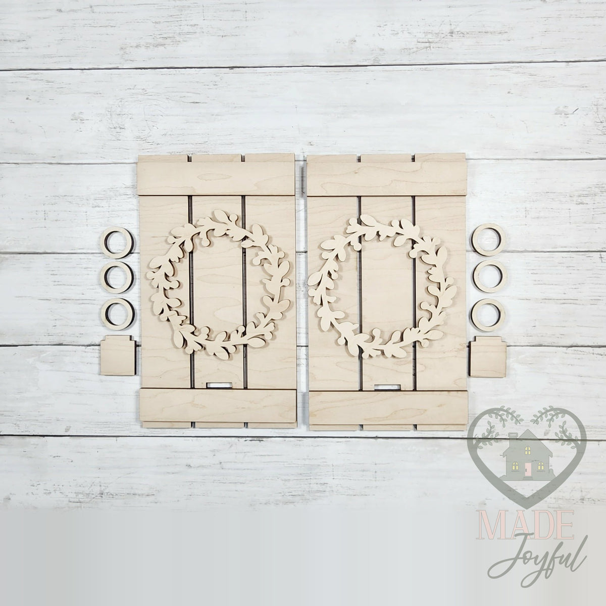 Unfinished laser-cut wood Folk Art Pallet Candle Sconce DIY kit, ready to paint at a DIY party in Williamson County, TN.