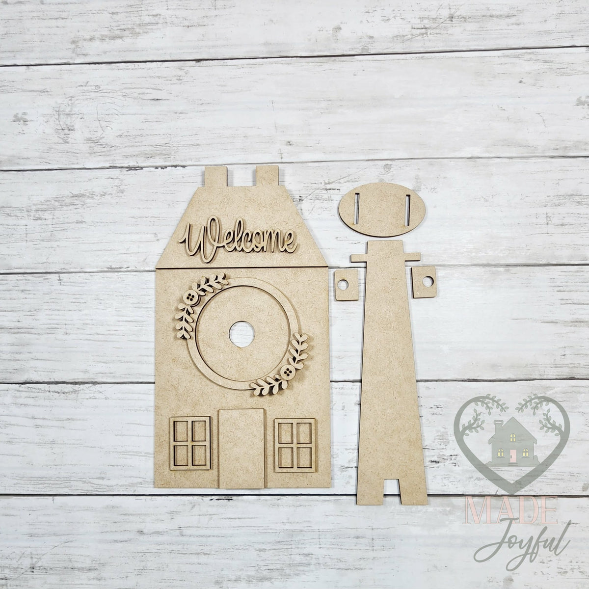 Unfinished laser-cut wood Saltbox House Interchangeable Display DIY kit (easel pieces), ready to paint at a DIY party in Williamson County, TN.