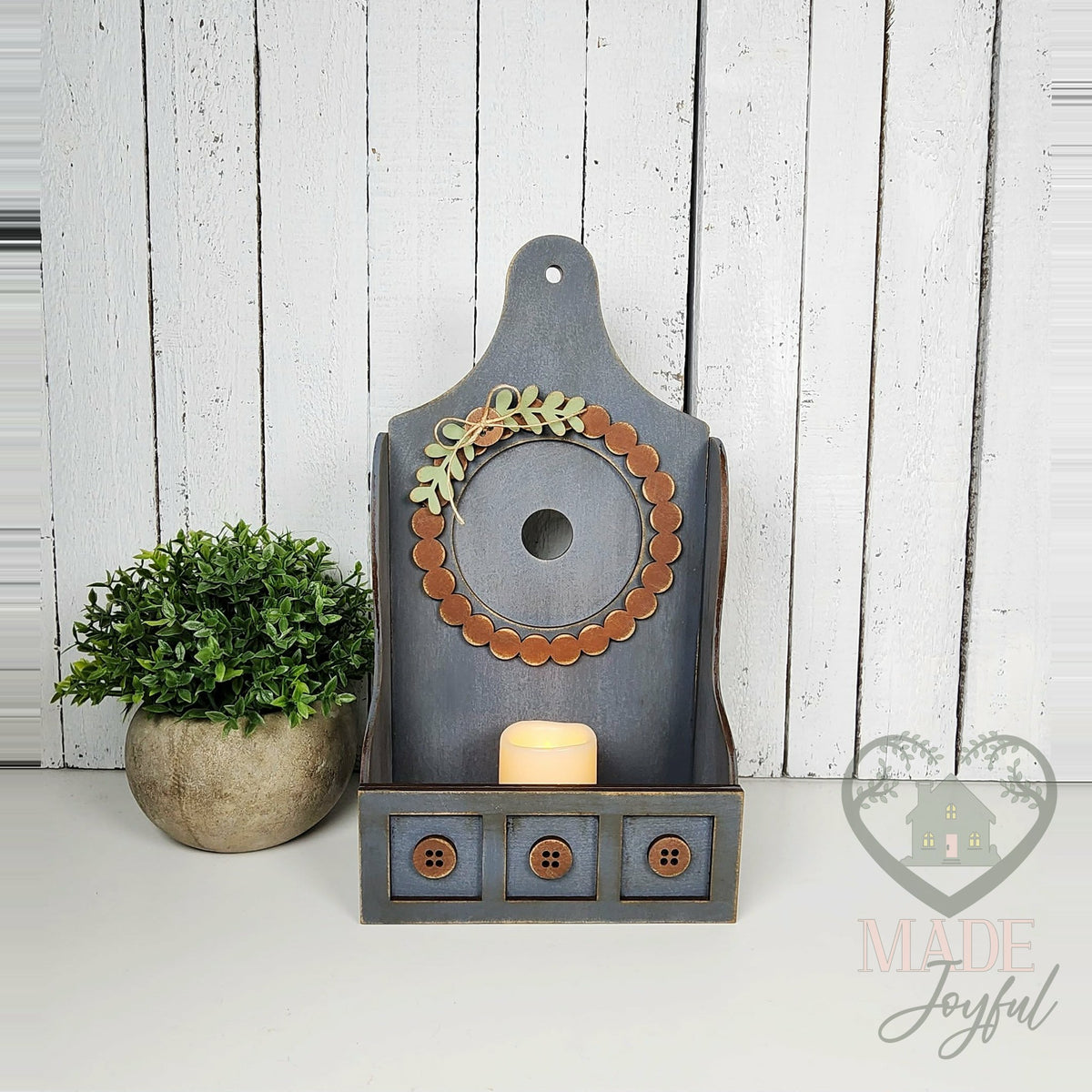Blue-gray Shaker tealight box with wreath and candle, hand-painted in Brentwood, TN.