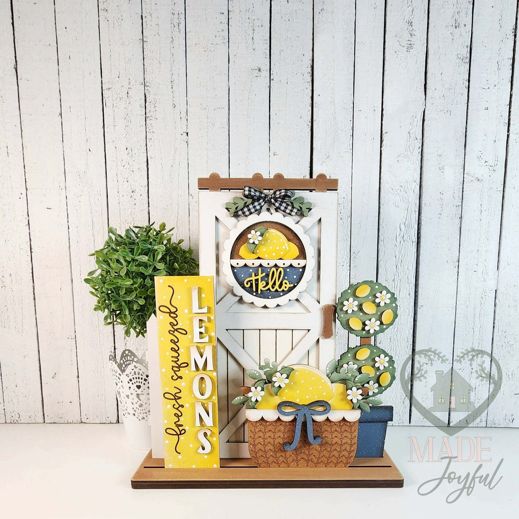 Lemon mini porch barn door set with white door, lemon topiary, and basket, hand-painted in Brentwood, TN.