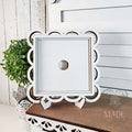 White scallop lace frame on an easel, hand-painted in Brentwood, TN.