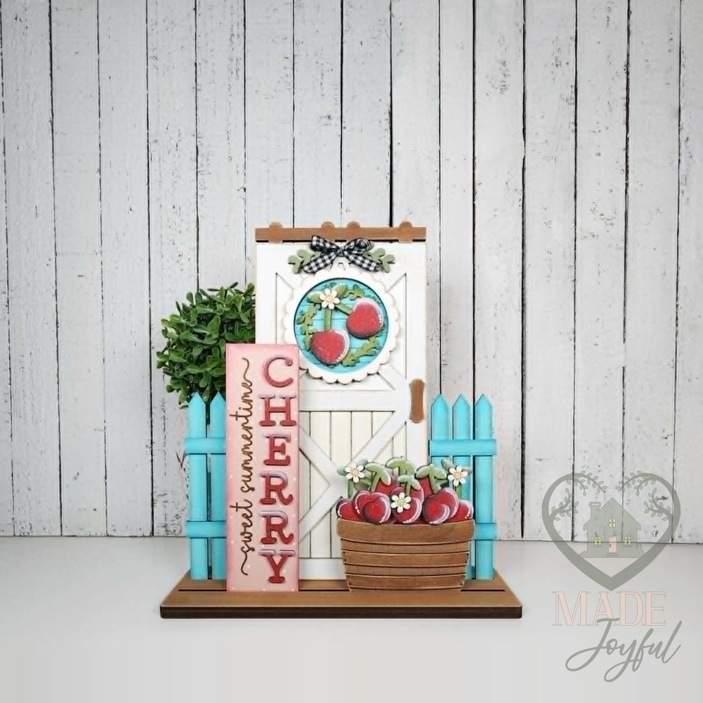Cherry mini porch barn door set with aqua fences and cherry basket, hand-painted in Brentwood, TN.