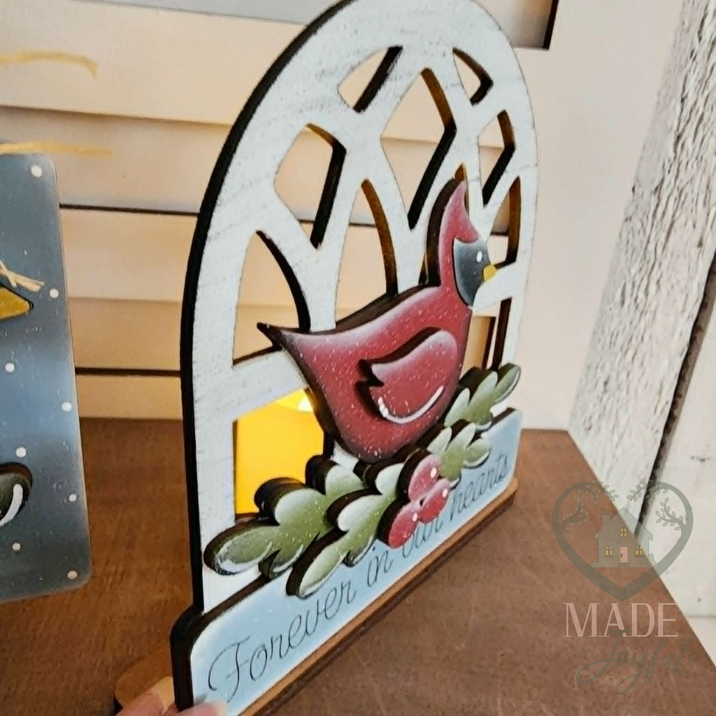 Forever in Our Hearts cardinal arch glowing, hand-painted in Brentwood, TN.
