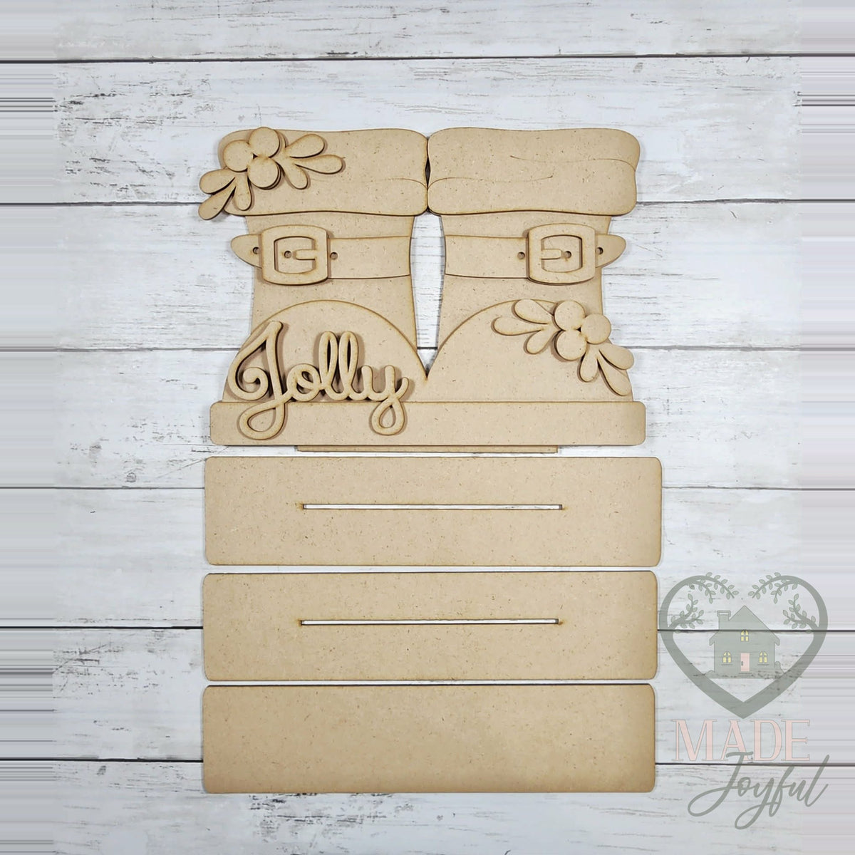 Unfinished laser-cut wood Jolly Santa Boots Shelf Sitter DIY kit, ready to paint at a DIY party in Williamson County, TN.
