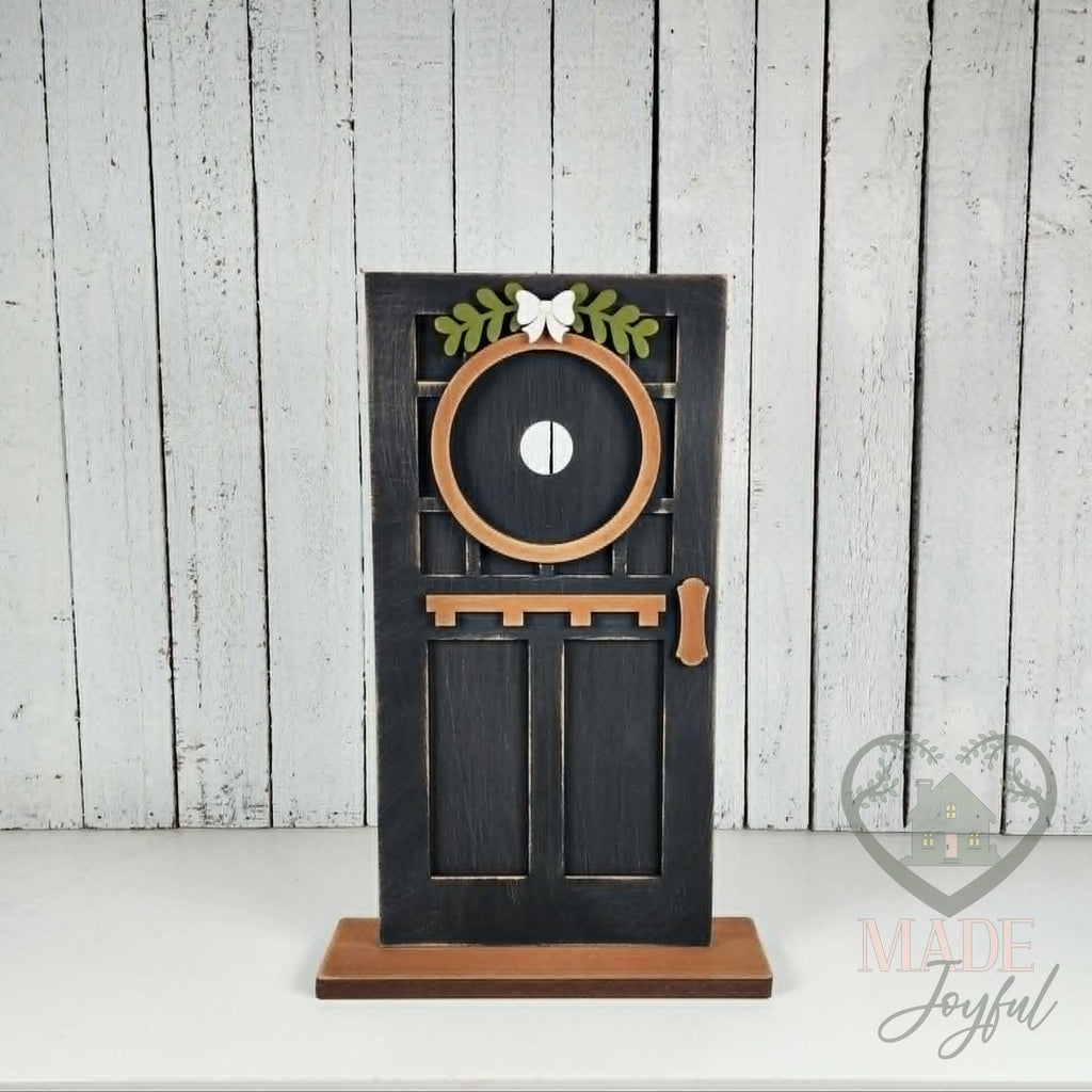 Black craftsman mini door, hand-painted in Brentwood, TN.