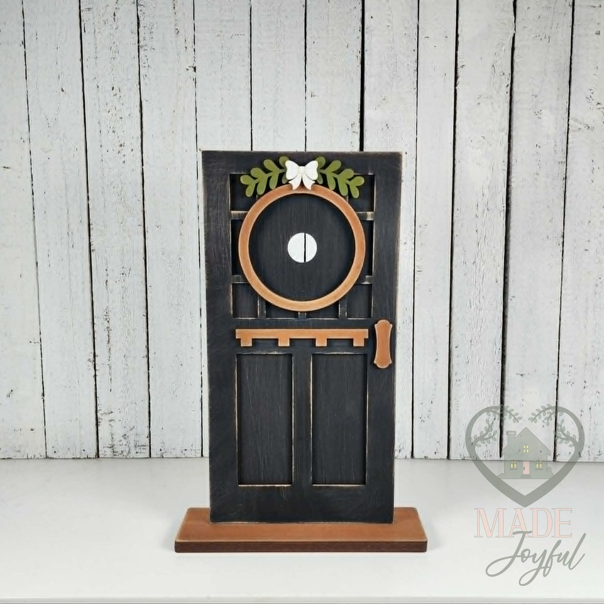 Black craftsman mini door, hand-painted in Brentwood, TN.
