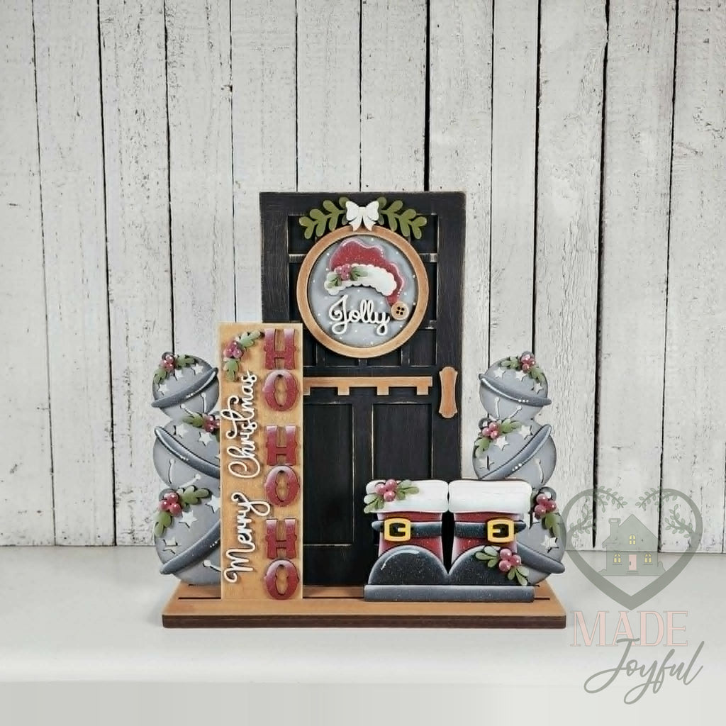 Merry Christmas porch insert set with jingle bell topiaries in a black door, hand-painted in Brentwood, TN.