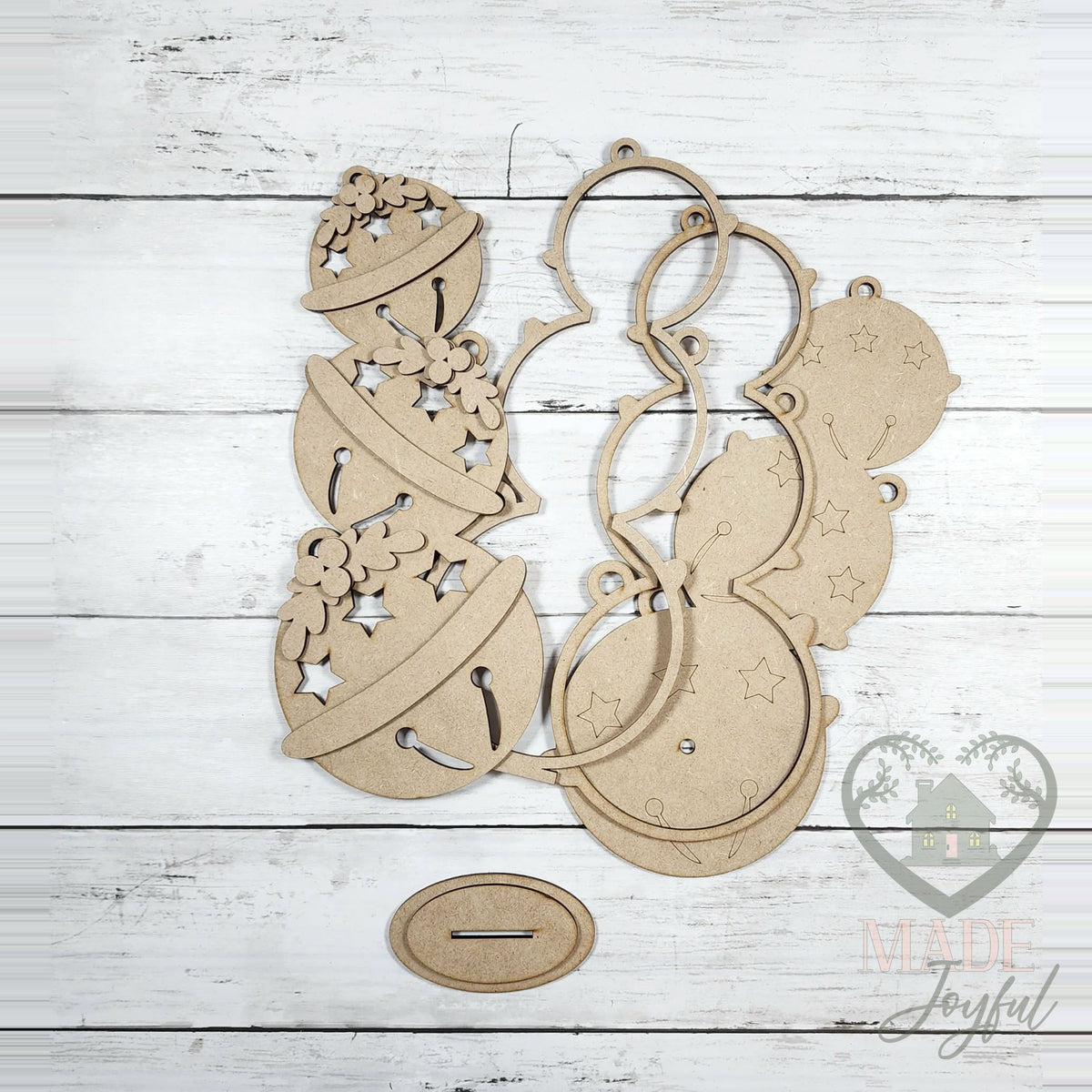 Unfinished laser-cut wood Lighted Jingle Bell Shelf Sitter DIY kit, ready to paint at a DIY party in Williamson County, TN.