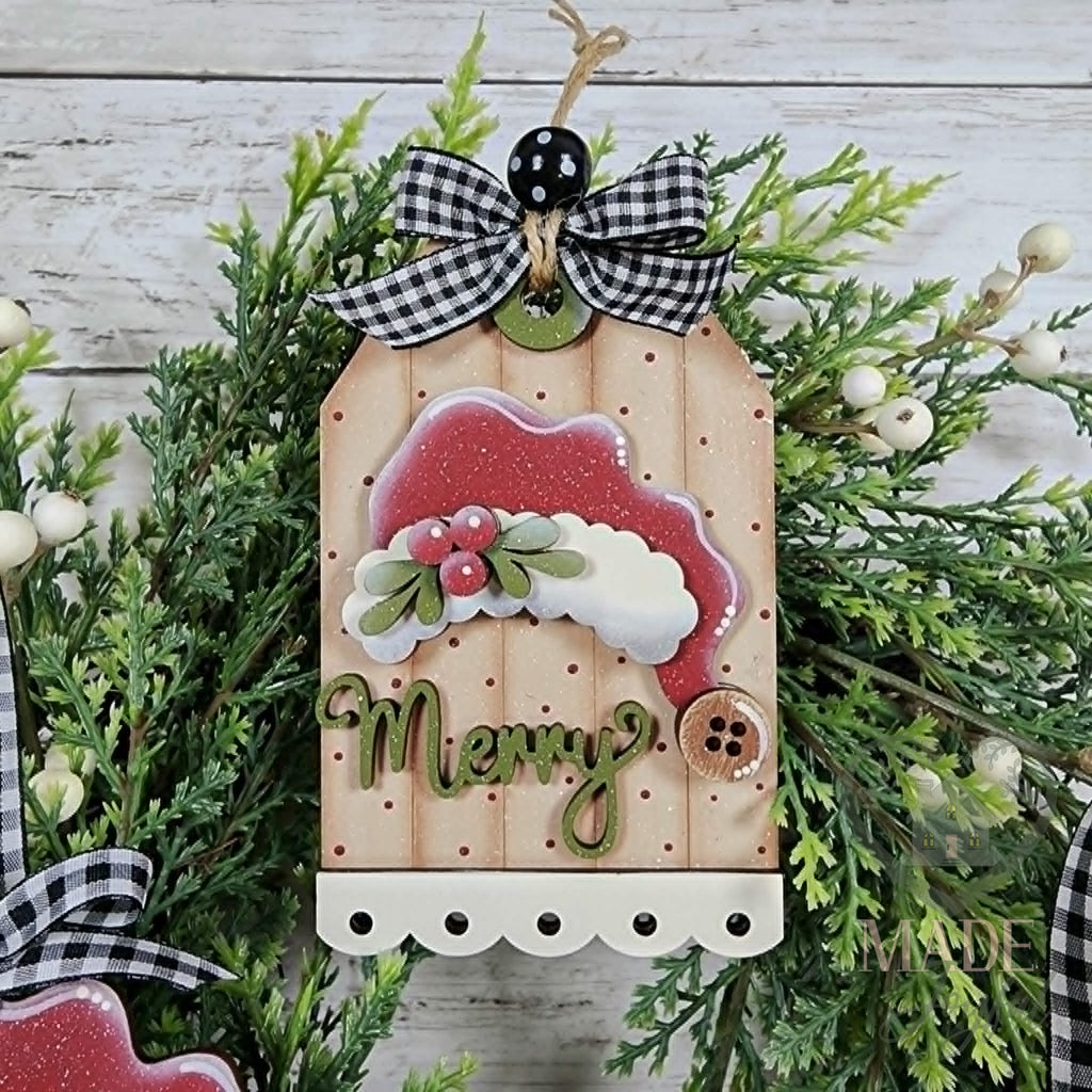 Merry tag ornament with Santa hat, hand-painted in Brentwood, TN.