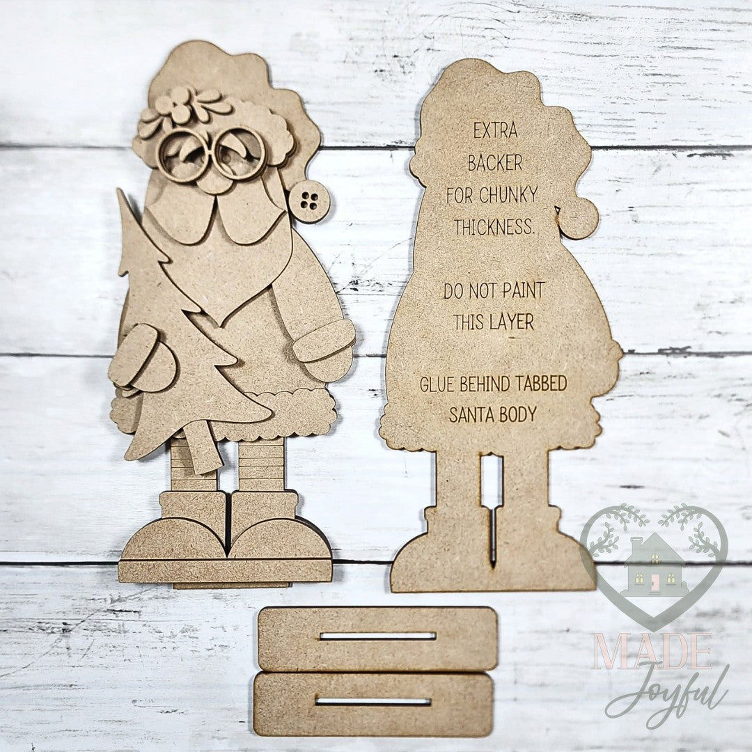Unfinished laser-cut wood Standing St. Nick Shelf Sitter DIY kit, ready to paint at a DIY party in Williamson County, TN.