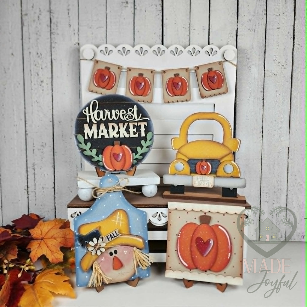 Harvest Market tiered tray set with round sign, yellow truck, and scarecrow, hand-painted in Brentwood, TN.