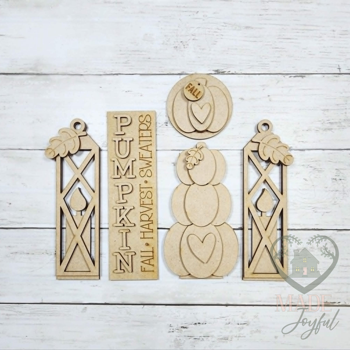 Unfinished laser-cut wood Pumpkin Porch Door Insert Set DIY kit, ready to paint at a DIY party in Williamson County, TN.