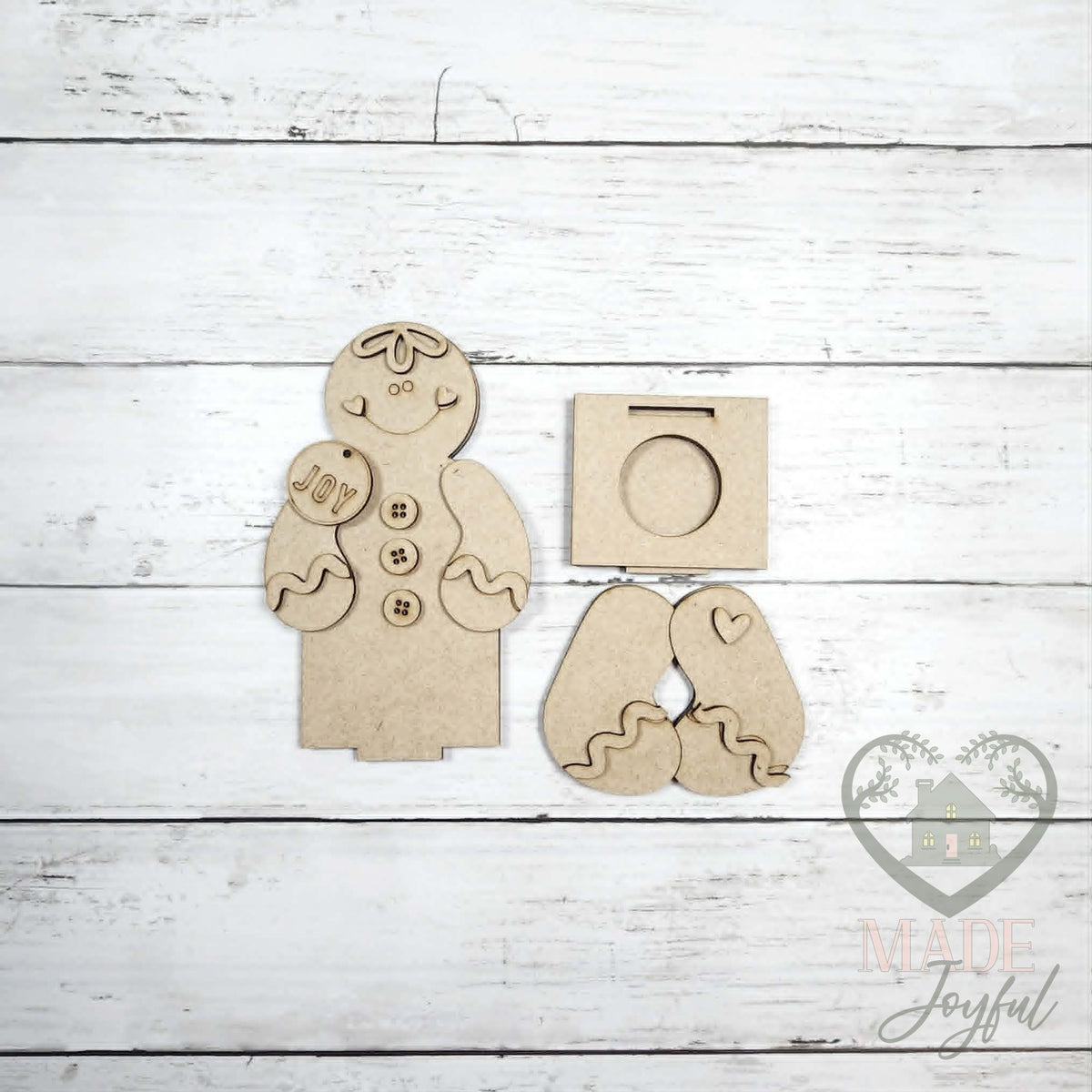Unfinished laser-cut wood Sweet Friends Votive Shelf Sitters DIY kit (gingerbread pieces), ready to paint at a DIY party in Williamson County, TN.