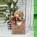Warm Wishes gingerbread shelf sitter with plaid bow, hand-painted in Brentwood, TN.