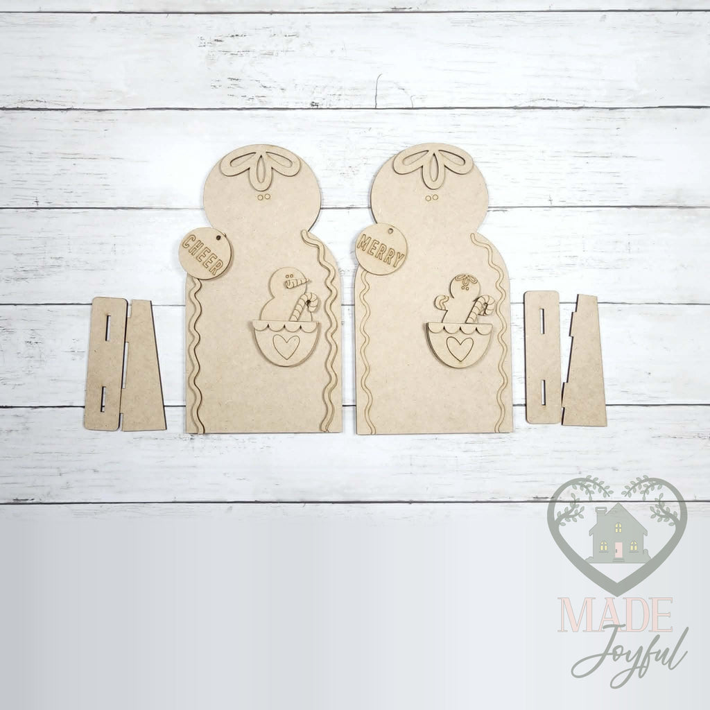 Unfinished laser-cut wood Pocket Gingerbread Shelf Sitters DIY kit, ready to paint at a DIY party in Williamson County, TN.