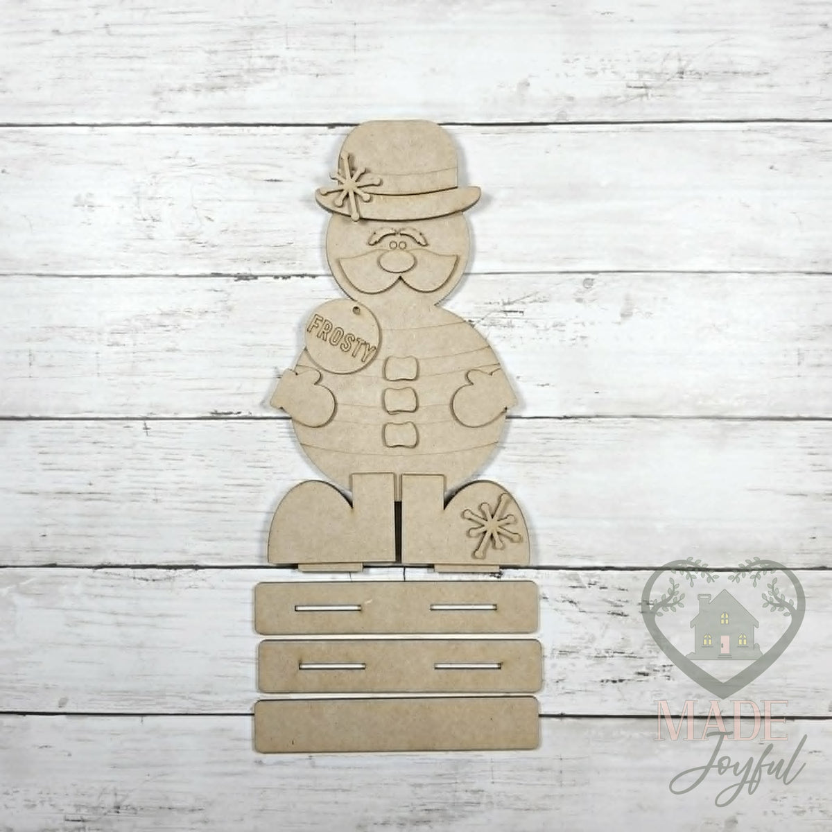 Unfinished laser-cut wood Sir Winston Snowmen Shelf Sitters DIY kit (Frosty pieces), ready to paint at a DIY party in Williamson County, TN.