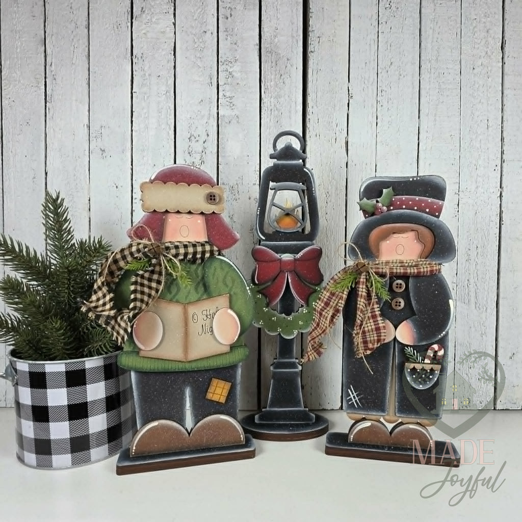 Christmas carolers with lamp post, hand-painted in Brentwood, TN.