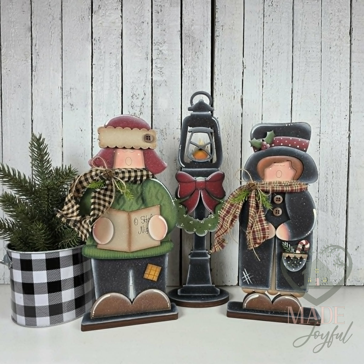 Christmas carolers with lamp post, hand-painted in Brentwood, TN.