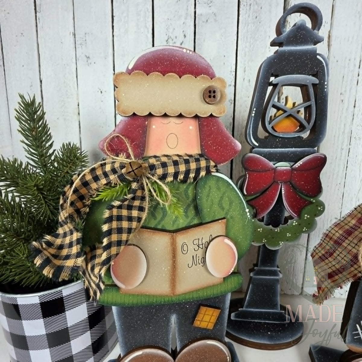 Caroler with lamp post, hand-painted in Brentwood, TN.