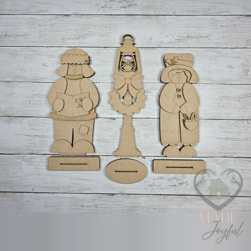 Unfinished laser-cut wood Christmas Carolers & Lamp Post Shelf Sitters DIY kit, ready to paint at a DIY party in Williamson County, TN.