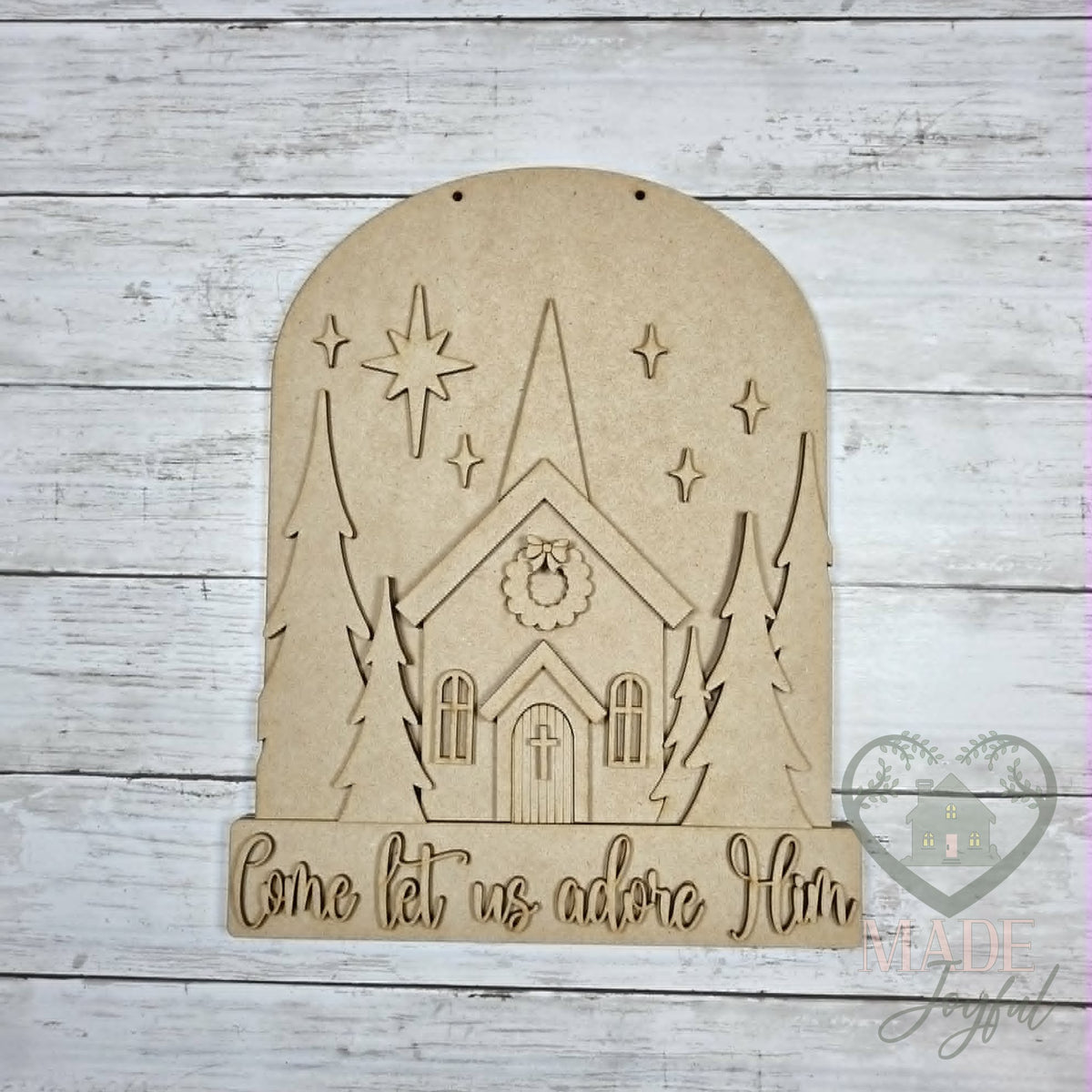Unfinished laser-cut wood Come Let Us Adore Him Church Door Hanger DIY kit, ready to paint at a DIY party in Williamson County, TN.