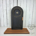 Black arched mini porch door, hand-painted in Brentwood, TN.