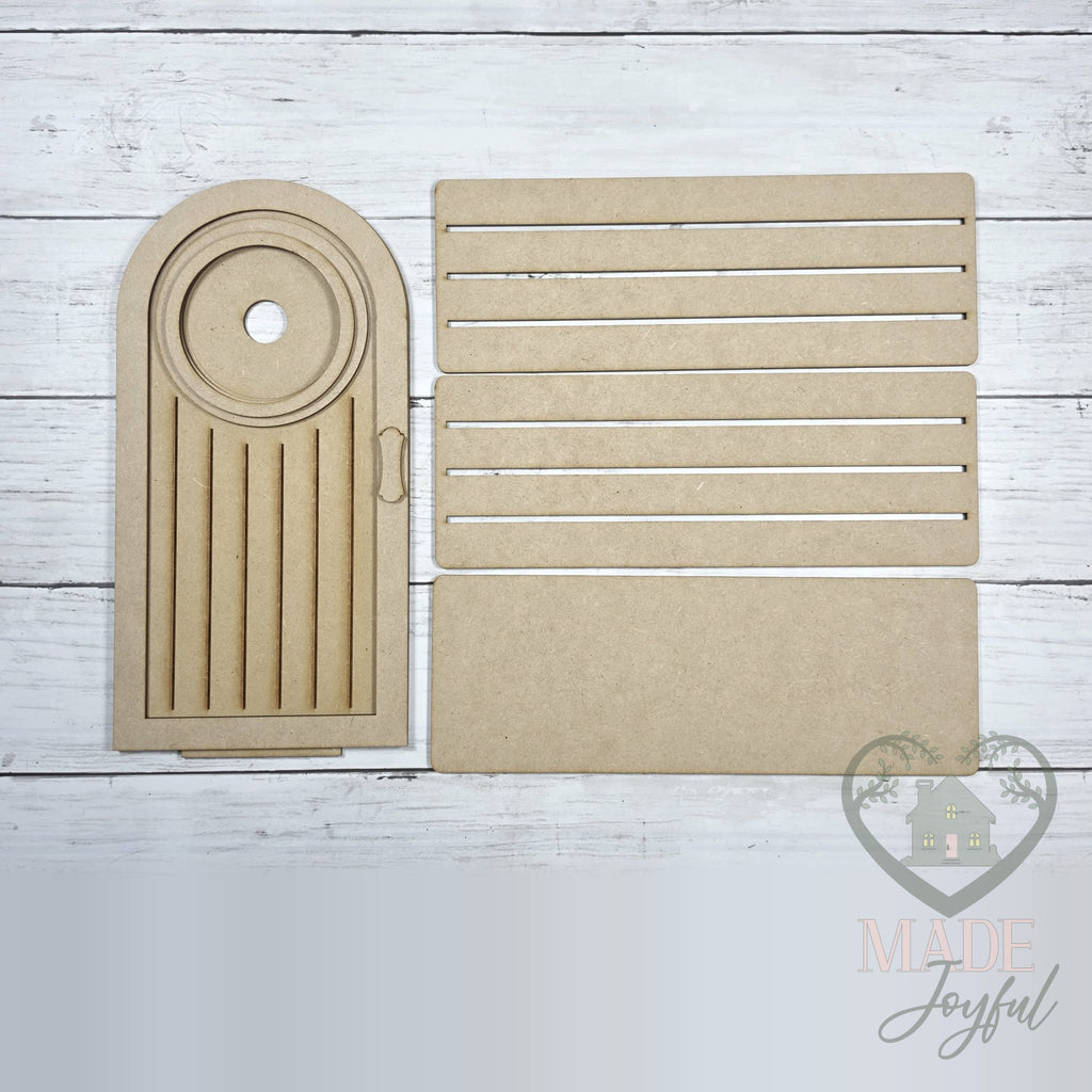 Unfinished laser-cut wood Arched Mini Porch Door DIY kit, ready to paint at a DIY party in Williamson County, TN.