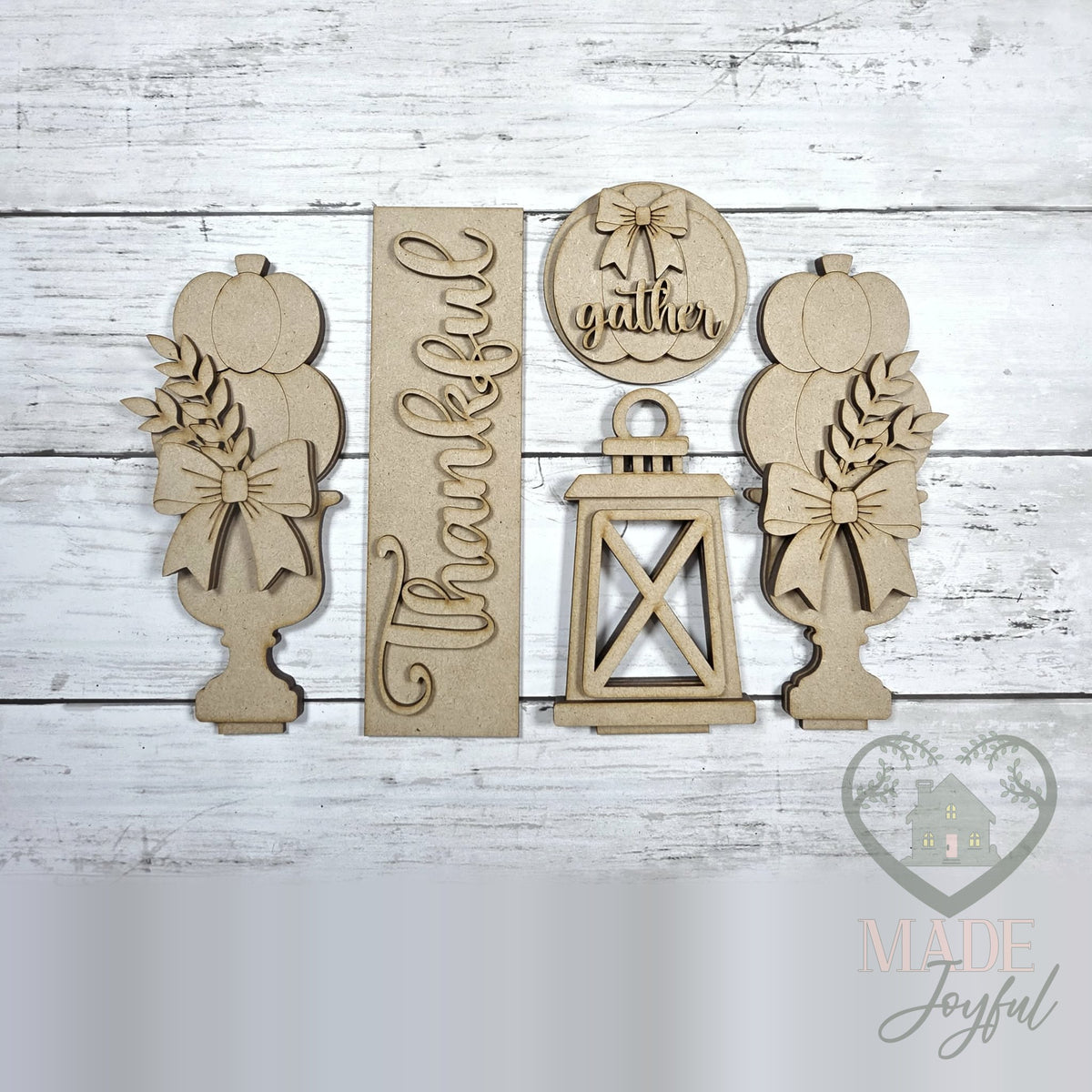 Unfinished laser-cut wood Thankful Porch Door Insert Set DIY kit, ready to paint at a DIY party in Williamson County, TN.