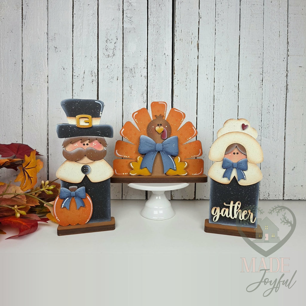Thanksgiving pilgrim boy, turkey, and pilgrim girl shelf sitters, hand-painted in Brentwood, TN.