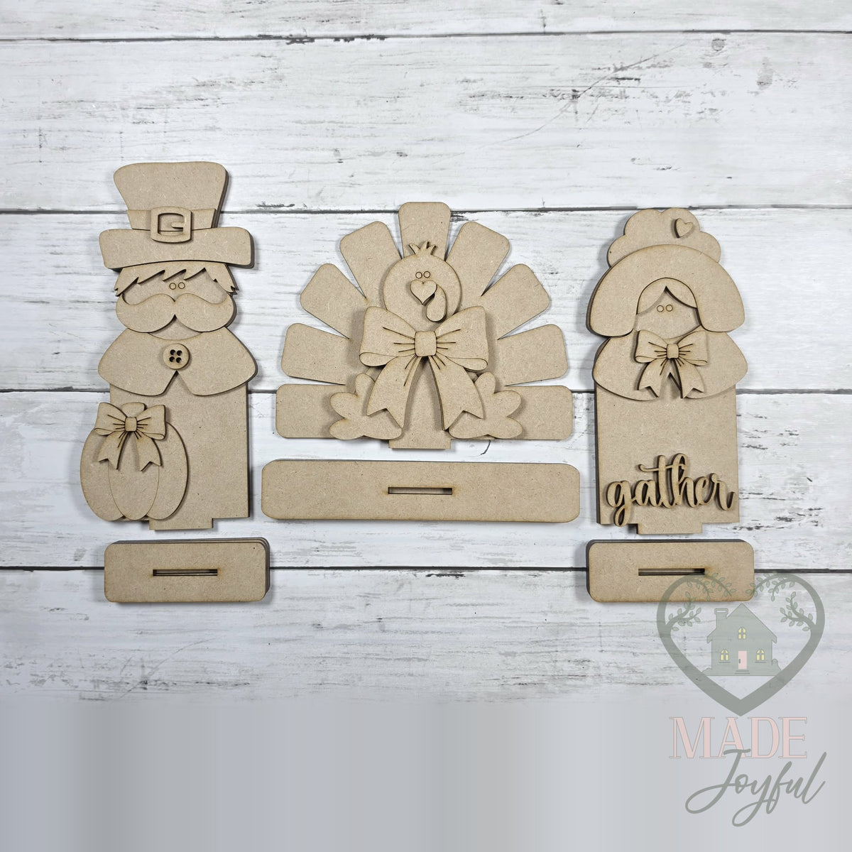 Unfinished laser-cut wood Thanksgiving Pilgrim & Turkey Shelf Sitters DIY kit, ready to paint at a DIY party in Williamson County, TN.