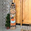 Happy Thanksgiving interchangeable porch leaner with a pilgrim hat, a Happy Thanksgiving sign, and a turkey on stacked pumpkins on a stained wood base