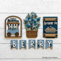 Blueberry interchangeable bench decor set with a Local Blueberries cart, a blueberry bush, a Blueberry Pie sign, and a BERRY banner