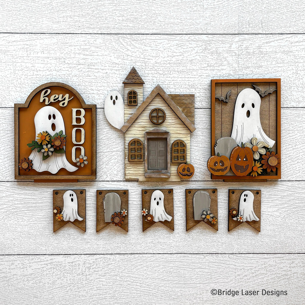Hey Boo Halloween interchangeable bench decor set with a Hey Boo ghost sign, a haunted church, a framed ghost, and a ghost banner