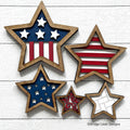 Patriotic nesting stars set of five layered wood stars in red, white, and blue with stars and stripes, hand-painted in Brentwood, TN