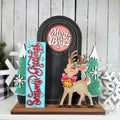Retro Christmas porch door insert set with Merry & Bright round, Season's Greetings sign, snowy trees, and reindeer on a black mini porch door, hand-painted in Brentwood, TN.