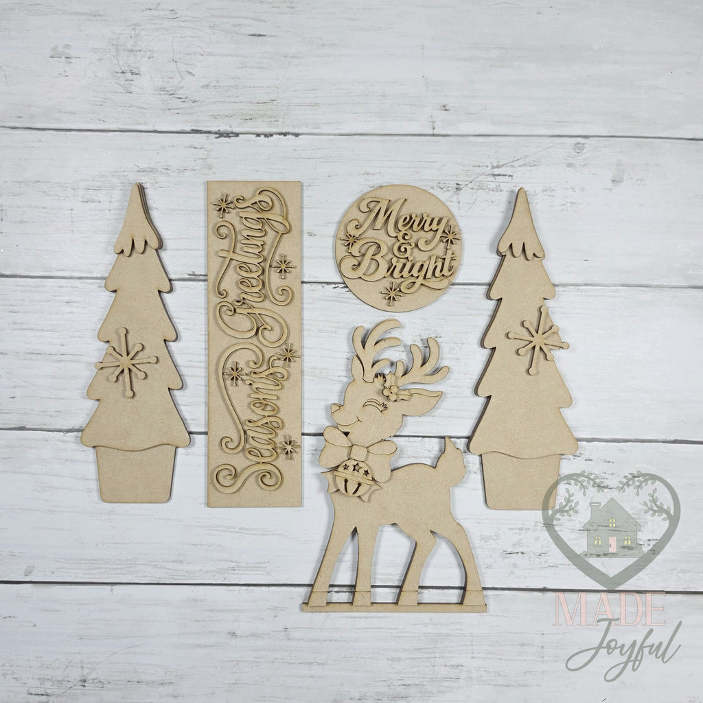 Unfinished laser-cut wood Retro Christmas Porch Door Insert Set DIY kit, ready to paint at a DIY party in Williamson County, TN.