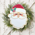 Retro Santa face door hanger with red hat and holly on a green wreath, hand-painted in Brentwood, TN.